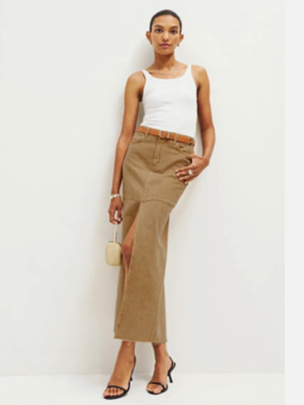 Reformation Tazz denim skirt. High-Rise Tan Maxi Skirt with Front Slit